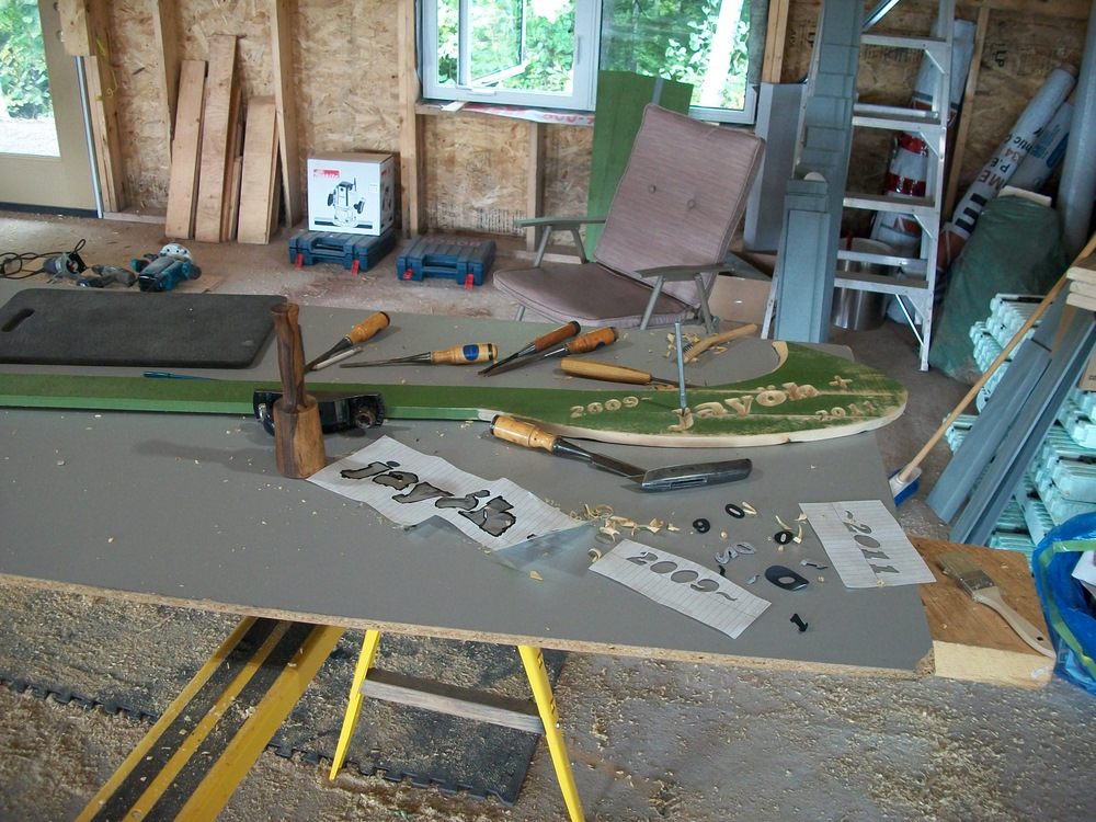 Gable end 'cornerstone' incised carving.