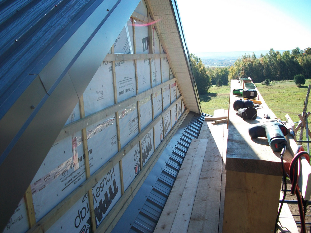 16" O/C PT strapping & lath, for vertical siding on little seen west gable.