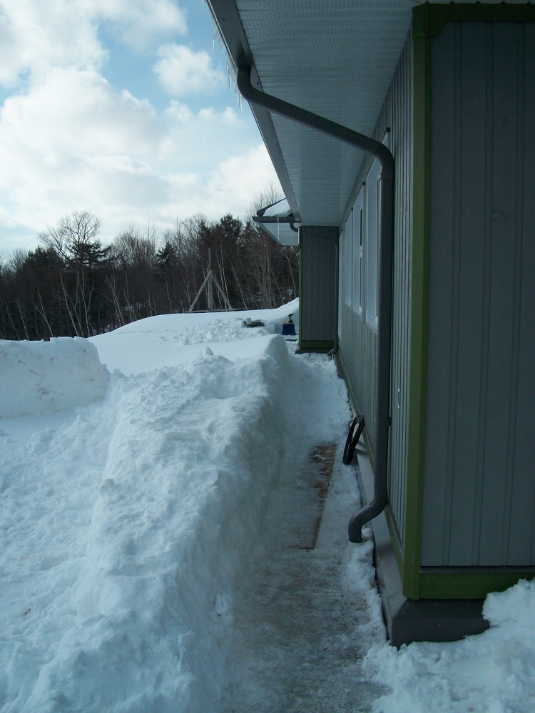 front wall finally sided, awaits the green frieze