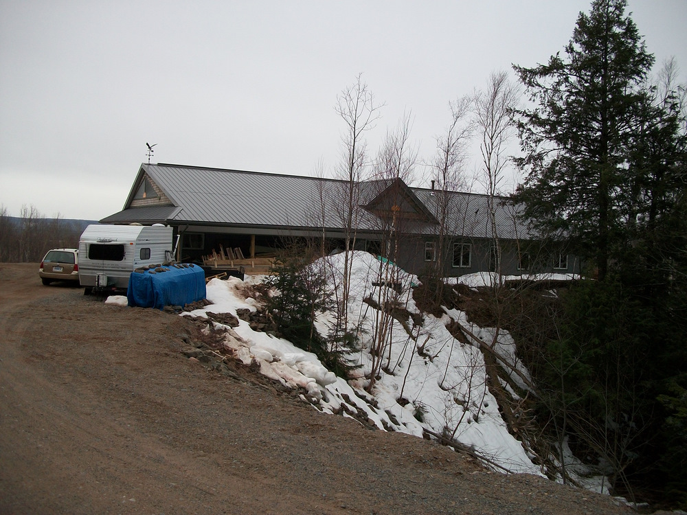 The white box is home, while the grey box moves closer to completion. Irony n'est pas?