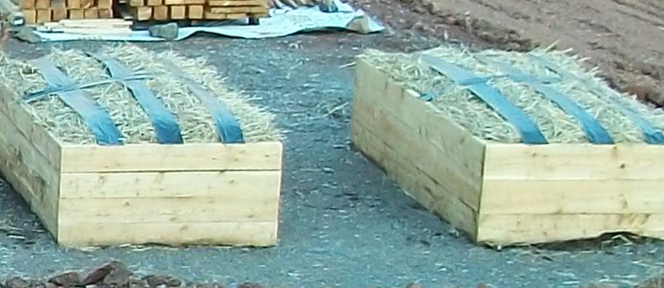 Plastic strips to anchor the straw in place before a good wet comes or prior to a bad wind arrives.