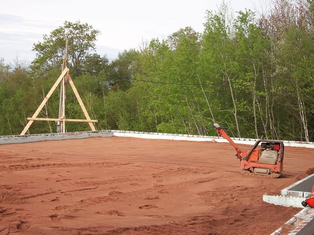 At least a weight in of 500 lb for this diesel compactor from R & A Rentals.Â Thanks Rick! . Over 33 truck loads of sand to backfill this foundation!