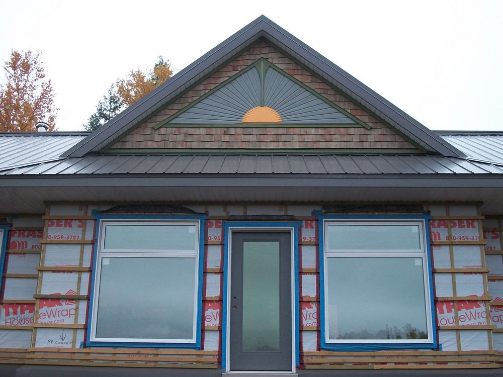 Main entrance finished sunburst replete with ubiquitous, but seldom seen green flash.