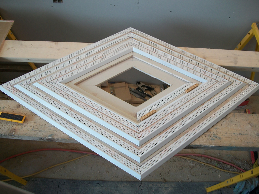 Tri-layered vestibule medallion.