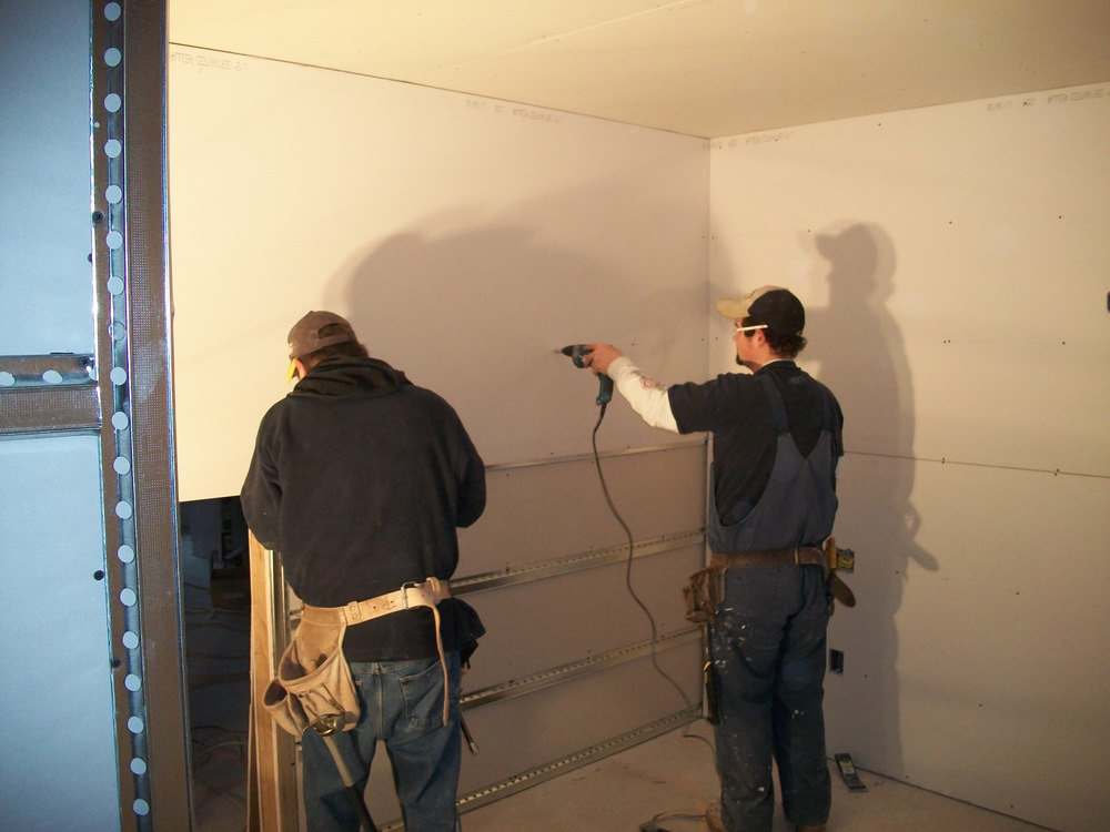 Father and son loving my walls.