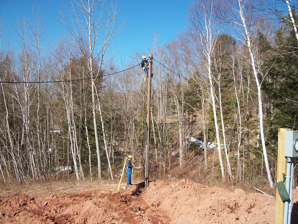 Two buddies from NS Power providing the construction hook-up. Jimmy’s the lad up the pole.